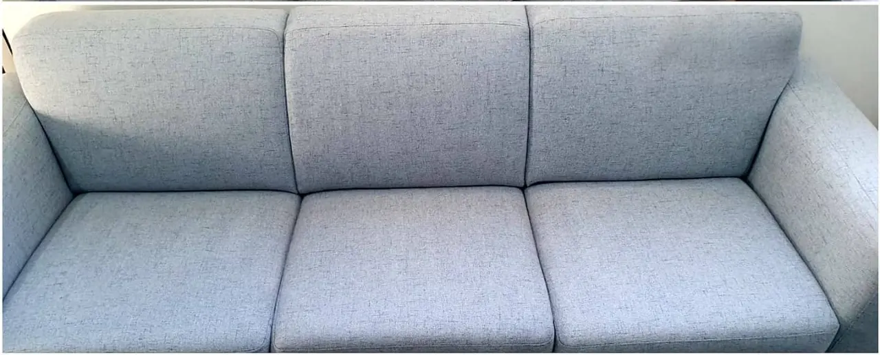 Stained carpet before and after professional clean — after