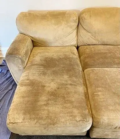 Sofa upholstery before and after cleaning — before